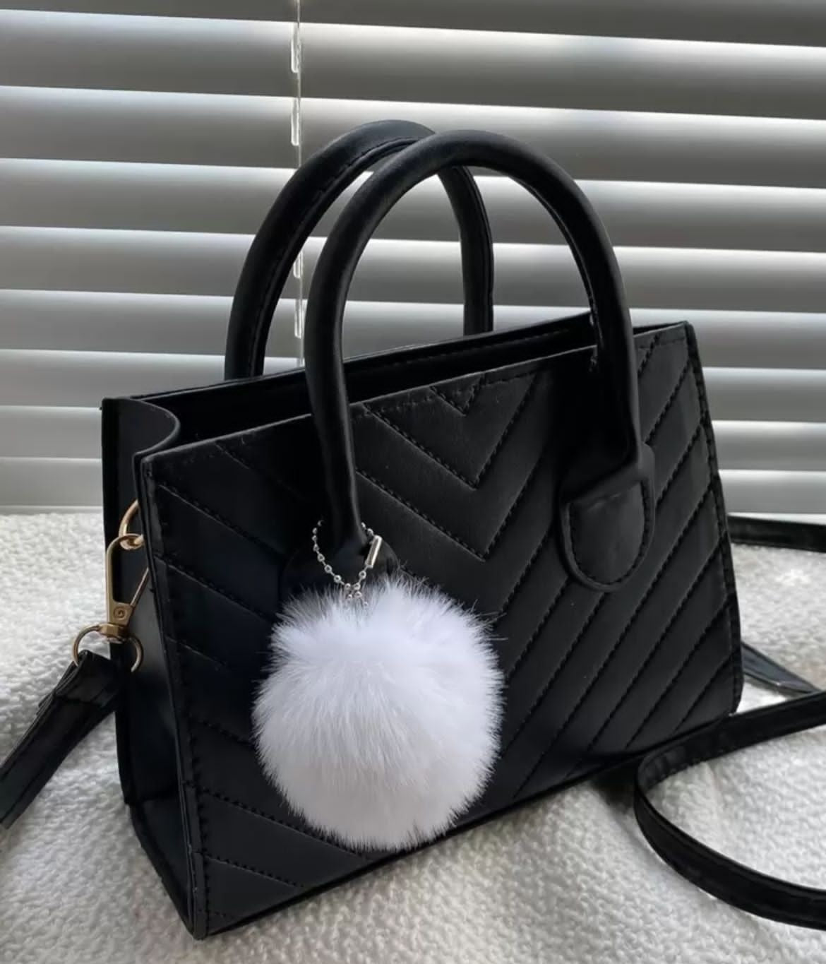 Black Quilted Chevron Handbag with Pom-Pom